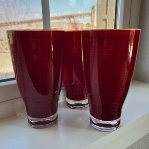 Three acrylic 16oz tumblers.  Red pattern exterior, orange interior.-